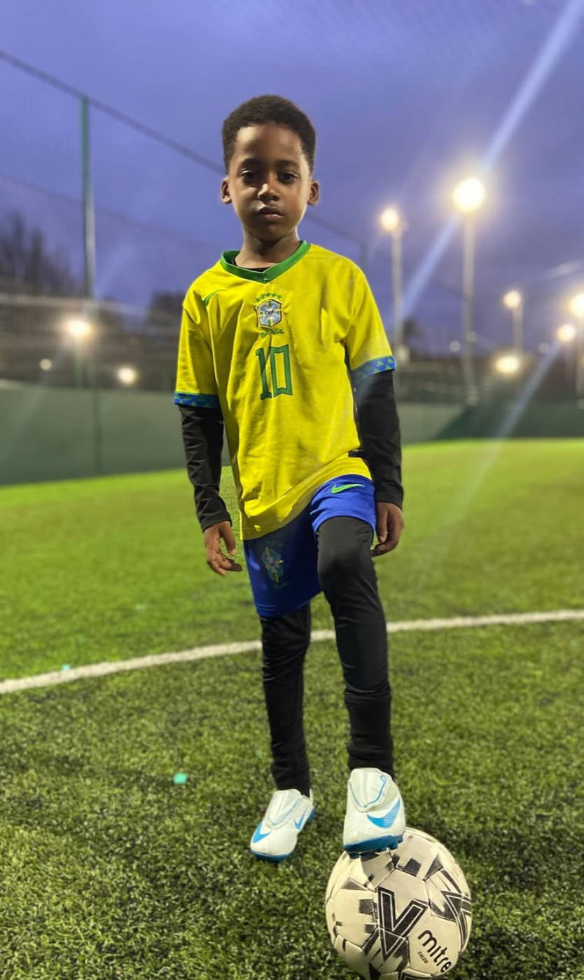 Young player in Brazil kit