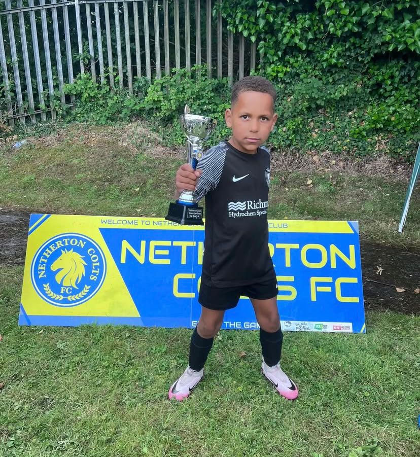 Young player with trophy